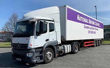 Artic LGV/HGV Cat C+E class 1 lorry with National Driving Centre signage